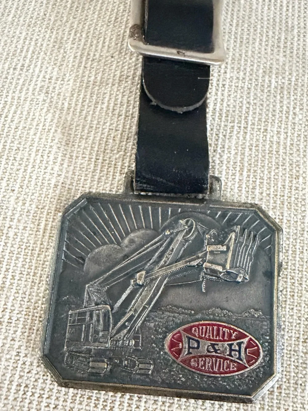 Black Leather Luggage Tag with Metal Excavator Emblem